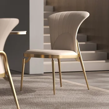 Işık lüks ev Modern minimalist tasarımcı yeni masa ve sandalye kombinasyonu paslanmaz çelik High end masa ve sandalye